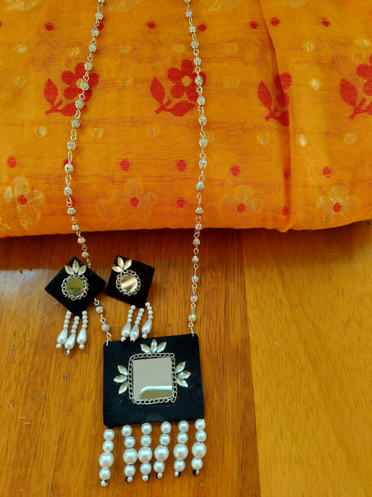 black pendent febric jewellery with oxidise ball